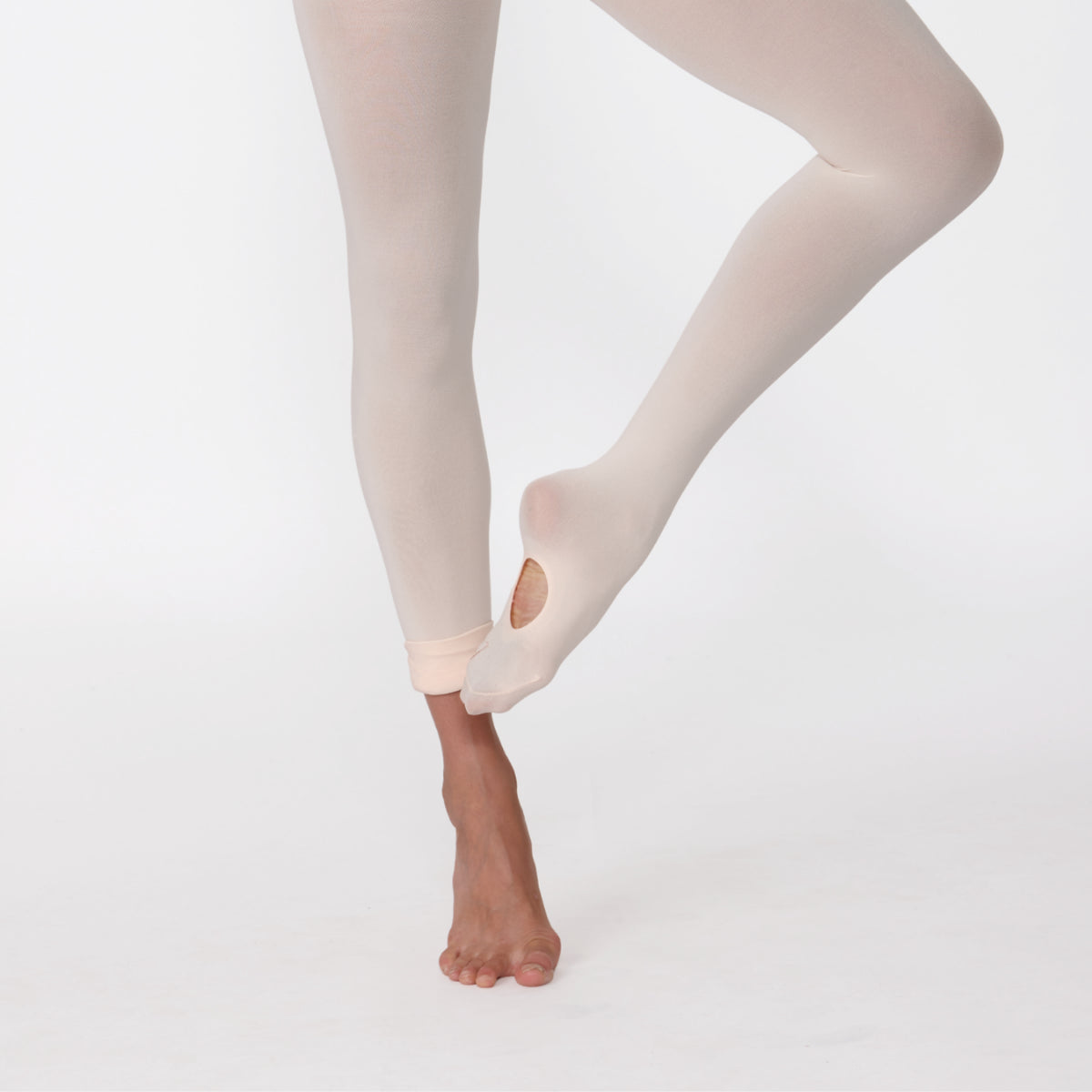 Beige tights worn by a person on a white background