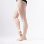 Beige tights worn by a person on a white background