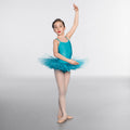 Young dancer in a turquoise ballet outfit posing against a white background