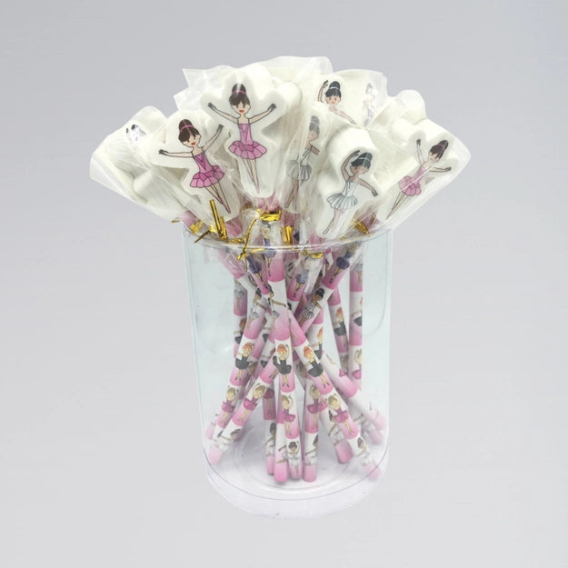 Bouquet of pink and white straws with ballerina design in a clear glass container on a gray background
